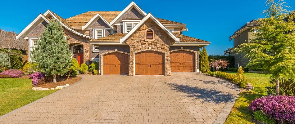 Paver driveway and large house in Olathe, KS.