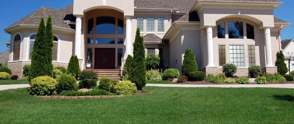 House with nice landscaping on a property in Olathe, KS.