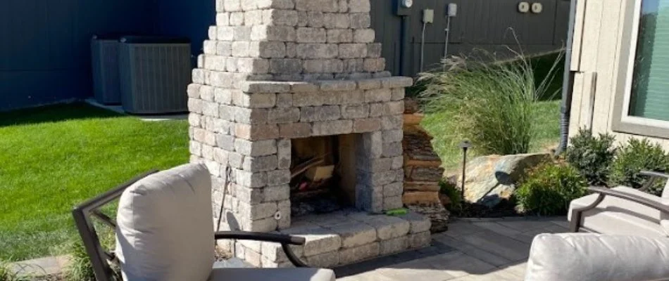 Outdoor fireplace on a patio in Olathe, KS.