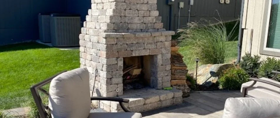 Outdoor fireplace on a patio in Olathe, KS.