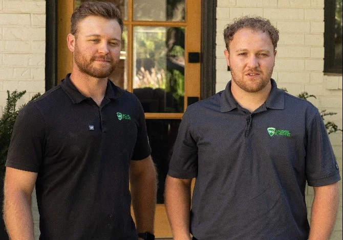 Maintained landscape bed with purple blooms.